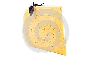 A piece of hard cheese on a white isolated background close-up