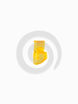 A piece of hot fresh yellow pepper on a white background. Levitation. Salsa, sauces, spicy dishes, condiments. Restaurant,