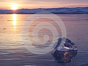 A piece of ice lying on the frozen surface of lake Baikal