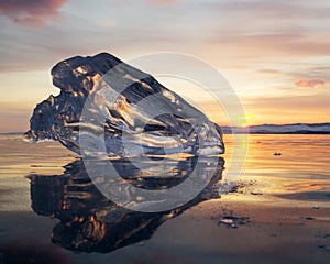 A piece of ice lying on the frozen surface of lake Baikal