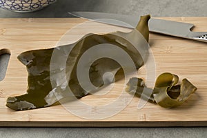 Piece of Japanese kombu soaked seaweed photo