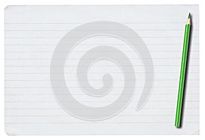 Piece of lined paper and pencil on white