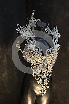 Piece made with 3d printer, is composed of white flowers that form a corset, handmade, fantasy design Baroque style