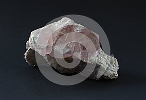 Piece of Morganite mineral a gem-quality beryl colored pink or rose-lilac