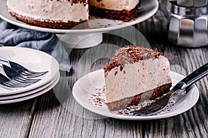 A piece of no-bake chocolate cheesecake on a plate