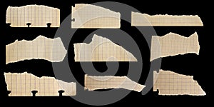 a piece of old squared paper on a black background