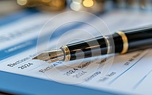 A piece of paper with the word Election written in black ink and a blue pen resting beside it.