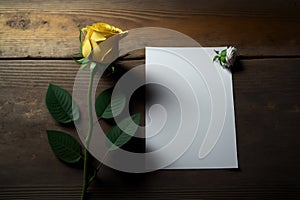Piece of paper and yellow rose on a wooden table, ai generated