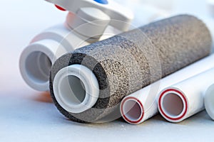 Polypropylene pipe sections and insulation photo