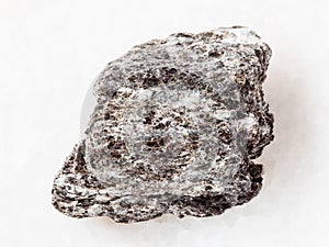 piece of quartz-biotite schist stone on white photo