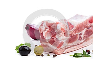 Piece raw meat with decor from on side