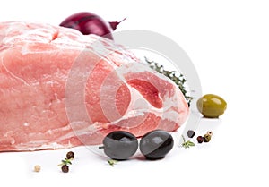 Piece raw meat with decor from on side