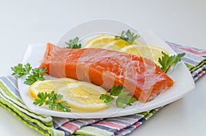 Piece of raw salmon on a plate