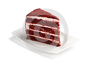 A piece of red velvete cake on isolated white background