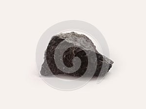 Piece of Rhyolite rock isolated on white background.