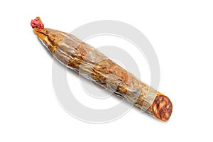 Piece of Spanish chorizo sausage Chorizo iberico on white background.