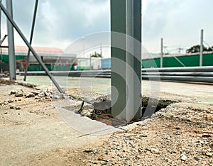 A piece of structural steel pier in underground pit.