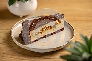 Piece of tasty chocolate nougat cake