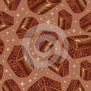 Pieces of aerated chocolate on a brown background