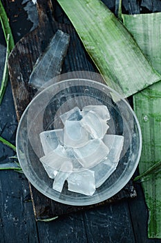 pieces of aloe vera gel in a glass bowl