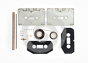 Pieces of Analogue Cassette on White Background