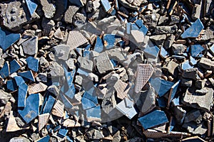 Pieces of beaten tiles and concrete blocks.