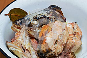 Pieces of boiled fish pike in a plate that look natural