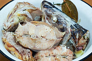 Pieces of boiled fish pike in a plate that look natural