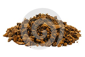 Pieces of chaga mushroom isolated on white background. Pieces of Inonotus obliquus isolated on white. Pile of chopped