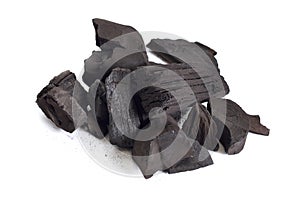 Pieces of charcoal isolated on white background