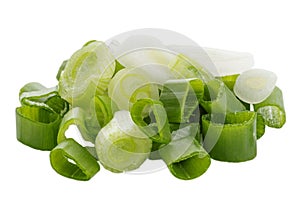 Pieces of chopped green onions are isolated on a white background