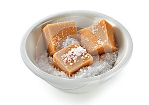 Pieces of creamy caramel fudge in salt