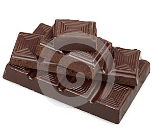 Pieces of dark chocolate isolated