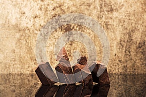 Pieces dark chocolate and space for text