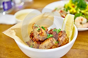 Pieces of deep-fried chicken in the Asian style