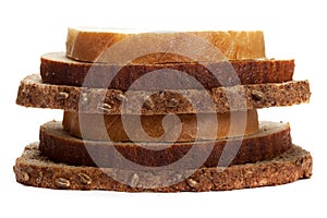 Pieces of different bread isolated on white background