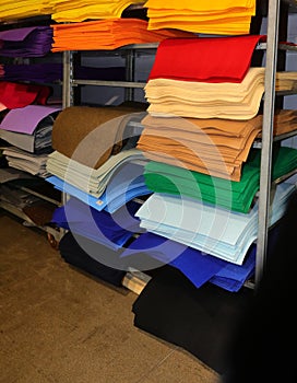 pieces of felt fabric for sale on shelf in hobby supplies store