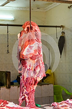 Pieces of fresh raw meat at the food market at Zanzibar