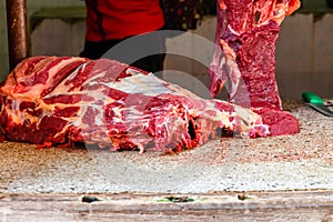 Pieces of fresh raw meat at the food market at Zanzibar