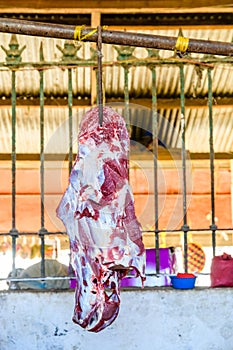 Pieces of fresh raw meat at the food market at Zanzibar