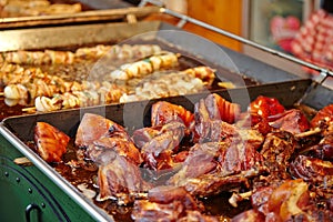 Pieces of fried pork meat with vegetables