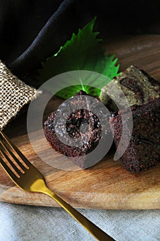 Pieces of Homemade Fudge Brownie on Wooden Board