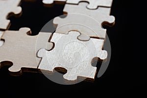 Pieces of jigsaw puzzle  as business strategy concept
