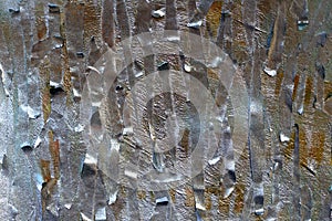 Pieces of masking tape painted with silver spray