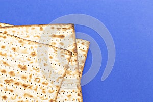 Pieces of Matzah Bread Unleavened Bread on a Blue Background