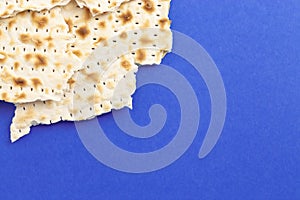 Pieces of Matzah Bread Unleavened Bread on a Blue Background