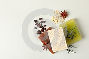 Pieces of natural handmade soap on white background