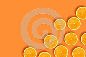 Pieces of orange on an orange background