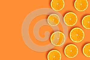 Pieces of orange on an orange background