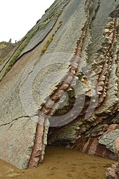 Pieces Of Pink Sandstone Wall Composed Of Fossil Records With Formations Of The Flysch Type Of The Paleocene Geopark UNESCO Basque